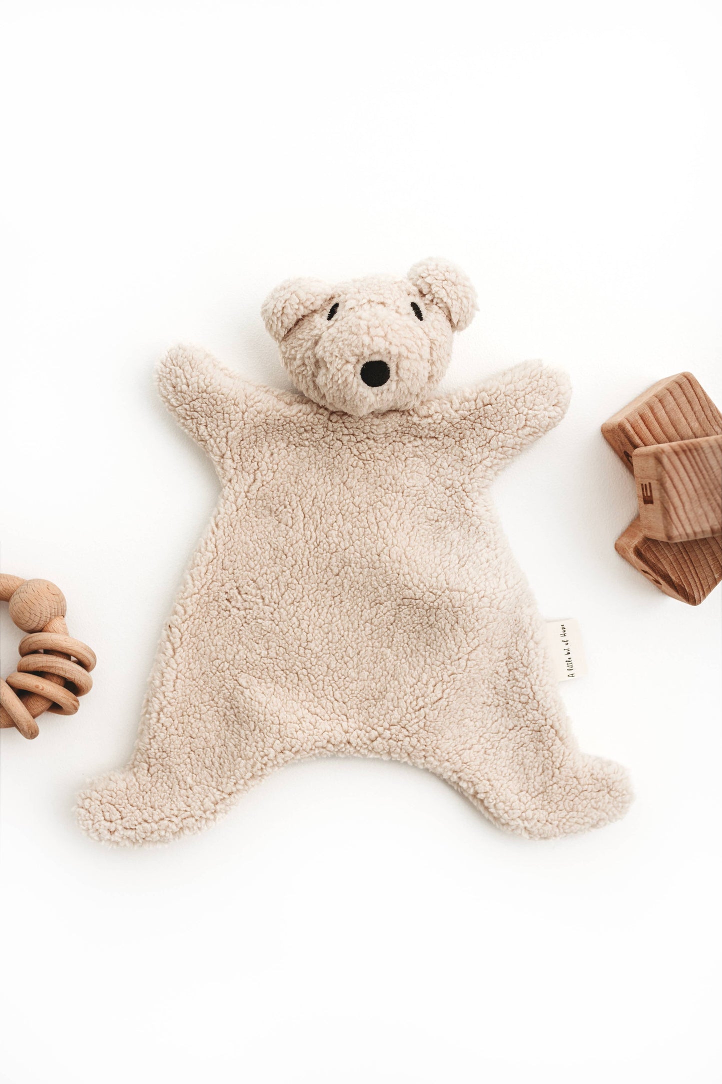 Cream snuggle bear
