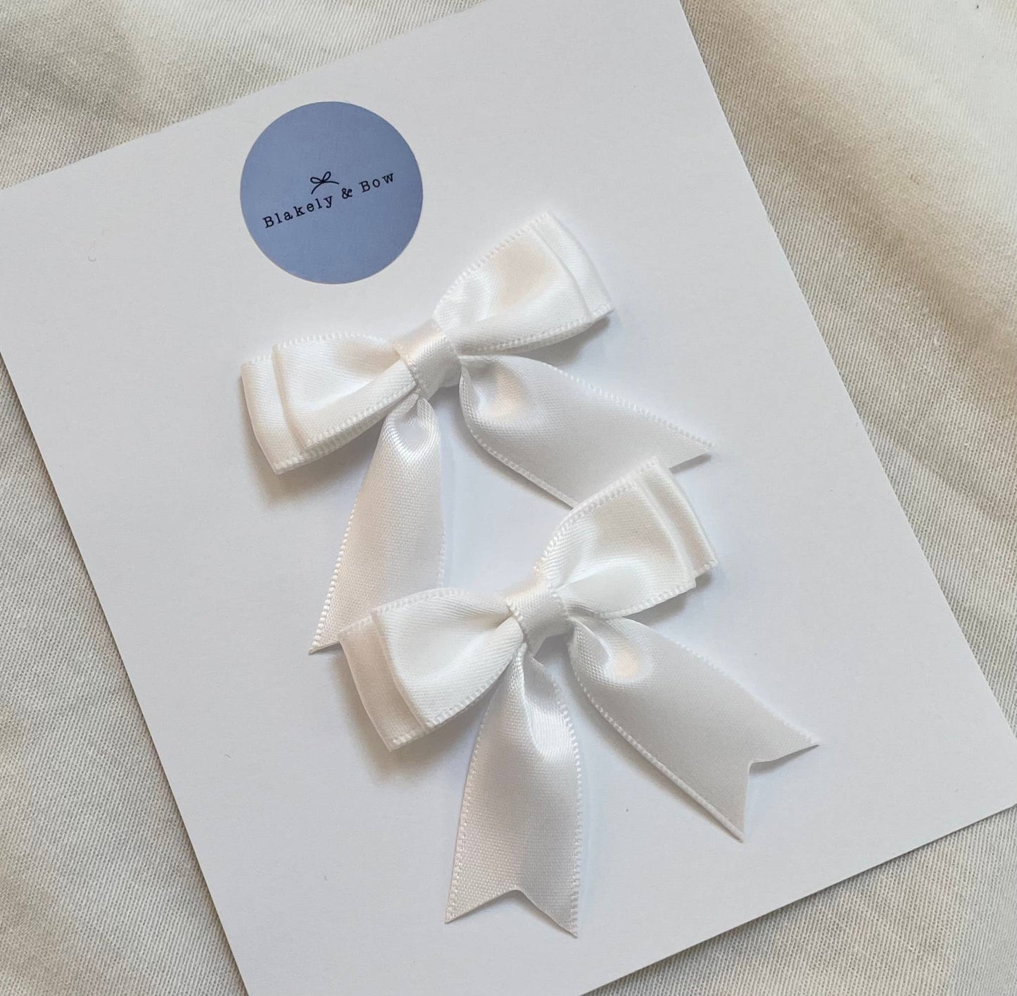 White - Satin pigtail bow sets